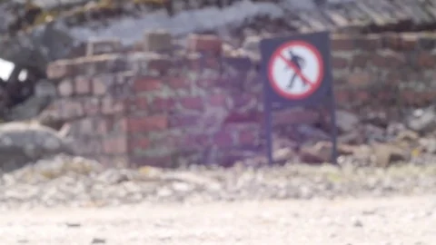 Stone wall and sign pass forbidden Stock Footage 74645514