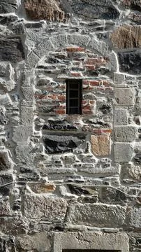Stone wall with arch middle age Stock Photos