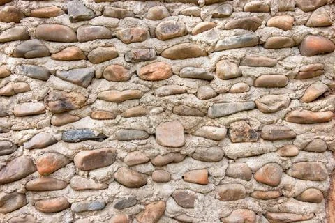 Stone wall backgorund texture a stone wall or path background texture Copy... Stock Photos