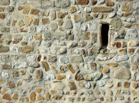 Stone wall background and window Stock Photos