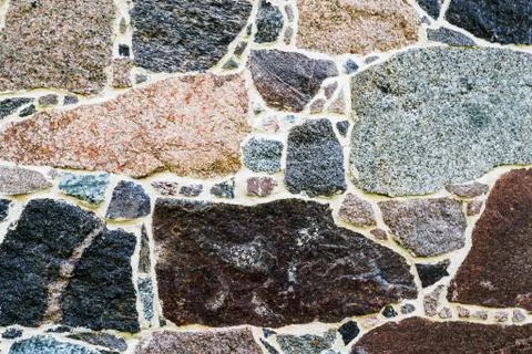 Stone Wall as a Background, Banner, Backdrop, Wallpaper, Poster, or Decorative Stock Photos
