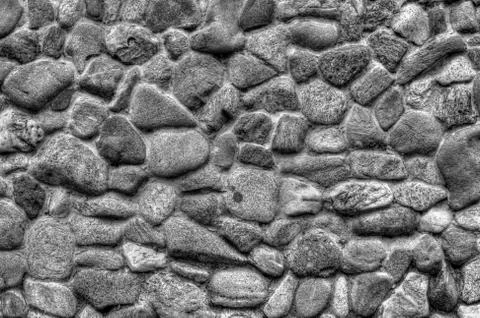 Stone wall background in black and white Stock Photos