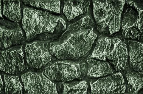 Stone wall background - building feature. Texture of thick and strong wall of Foto stock