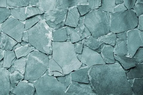 Stone wall background - building feature. Texture of thick and strong wall of Foto stock