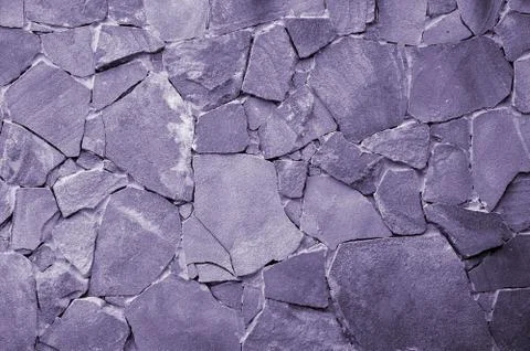 Stone wall background - building feature. Texture of thick and strong wall of 写真素材