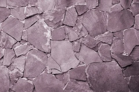 Stone wall background - building feature. Texture of thick and strong wall of Foto stock