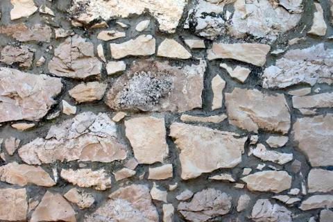Stone wall background, close up Stock Photos