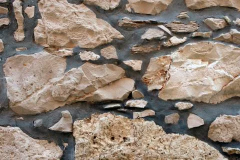 Stone wall background, close up Stock Photos