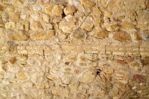 Stone wall background close-up Stock Photos