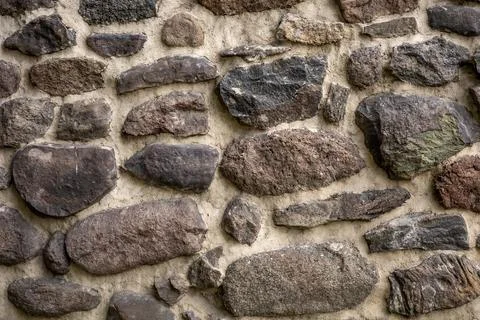 A stone wall background with copyspace. Stock Photos