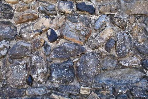 Stone wall background with lots of texture Stock Photos
