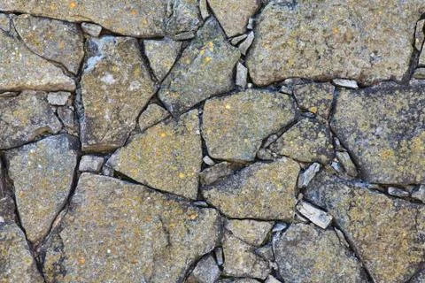 Stone wall background with lots of texture Stock Photos