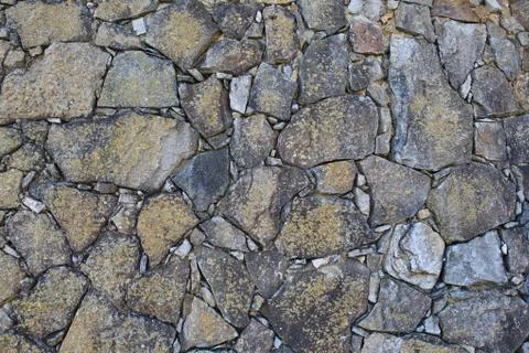 Stone wall background with lots of texture Stock Photos