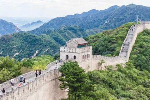 Stone wall on the background of mountains Stock Photos