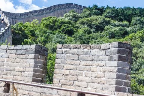 Stone wall on the background of mountains Stock Photos