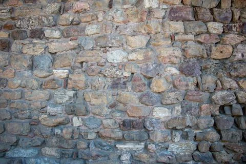 Stone wall as a background or texture. Fotos de archivo