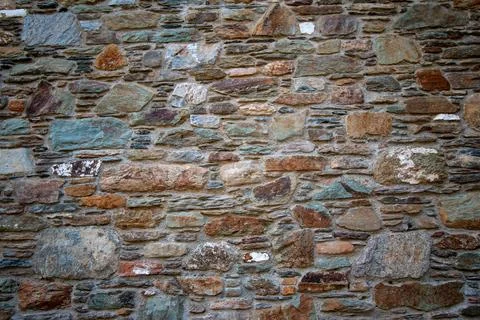 Stone wall as a background or texture. Stock-Fotos