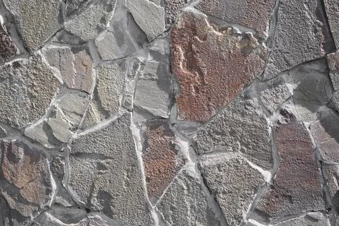 Stone wall as a background or texture Stock Photos