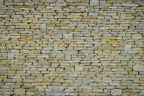 Stone wall background or texture Stock Photos