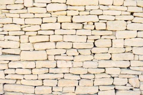 Stone wall background, pattern, wallpaper in provence, cote azur, france. Stock Photos