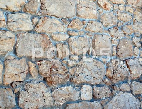 Stone wall background Stock Photos