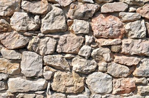 Stone wall background Stock Photos