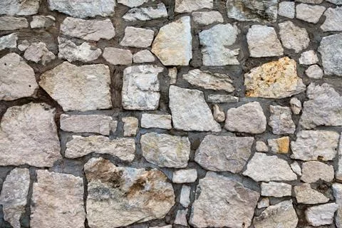 Stone wall for background Stock Photos