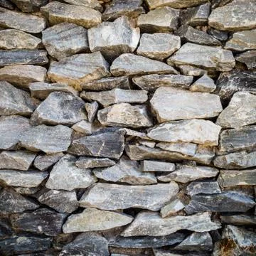 Stone wall background. Stock Photos