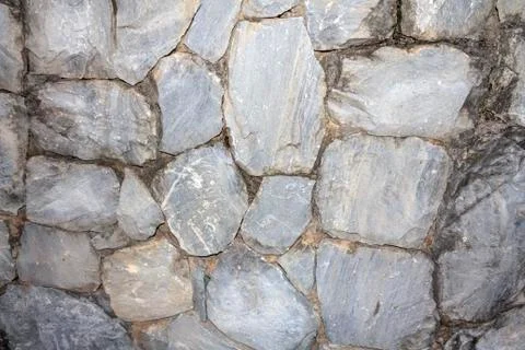 Stone wall background Stock Photos