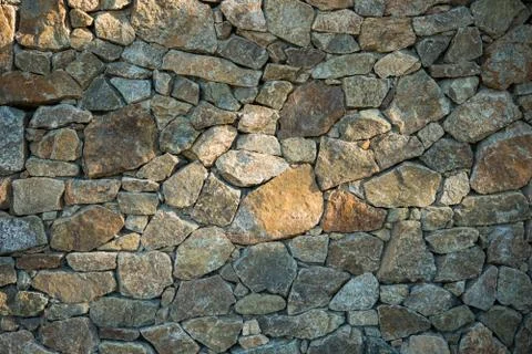 Stone wall background Stock Photos