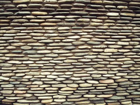 Stone wall background Stock Photos