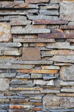 Stone wall background Stock Photos