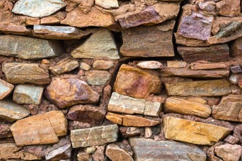 Stone wall background Stock Photos