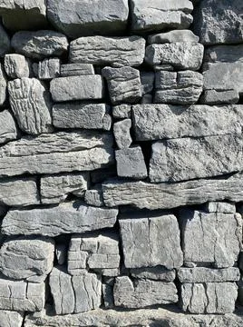 Stone wall background Stock Photos