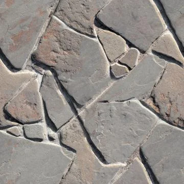 A stone wall as a background. seamless texture Foto stock