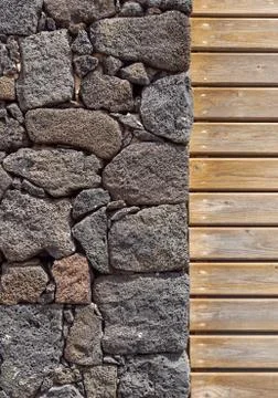 Stone wall background. stone and wood wall, wood texture as background. Wood Stock Photos