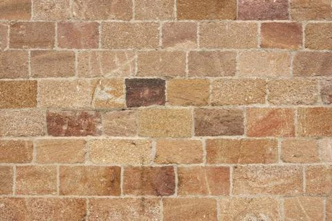 Stone wall background texture. Abstract pattern photo. Stock Photos