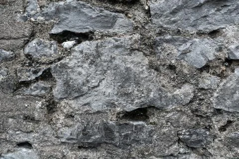 Stone wall background texture gray day large Stock Photos