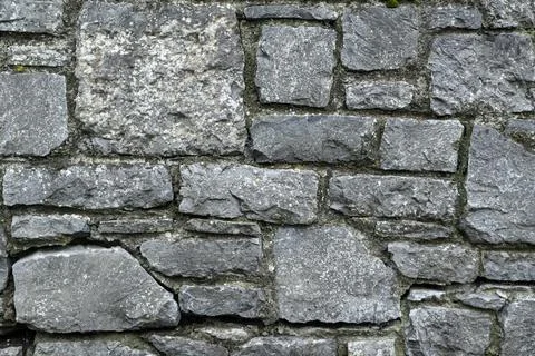 Stone wall background texture gray day large Stock Photos