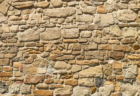 A stone wall background texture Stock Photos