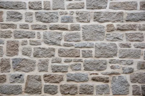 Stone wall background texture. Stock Photos