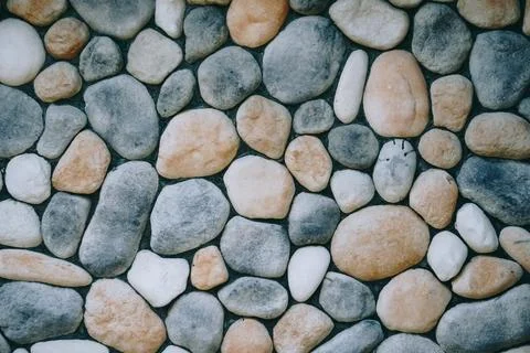Stone wall background texture. Stock Photos