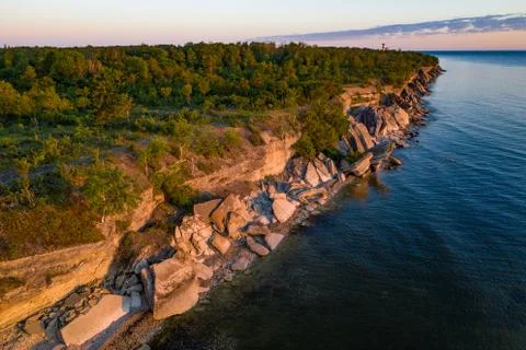 Stone wall on the Baltic sea in the summer. Pakri coast, island in Estonia, E Stock Photos