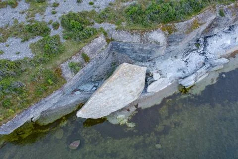 Stone wall on the Baltic sea in the summer. Pakri coast, island in Estonia, E Stock Photos