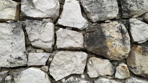 Stone wall built with natural material - crushed Stock Footage 218569101