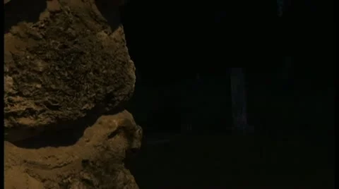 Stone Wall With Cemetery In The Background Stockbeeldmateriaal 11625385