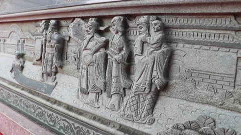 A stone wall Chinese relief people gods patterns Chinese traditional allusion  Video stock 197063953