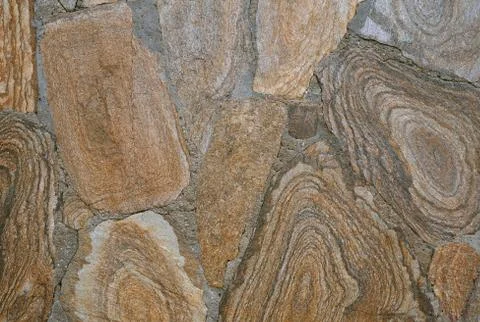 Stone wall closeup Stock Photos