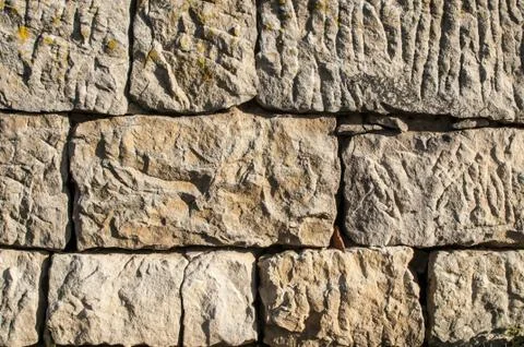 Stone wall closeup Stock Photos