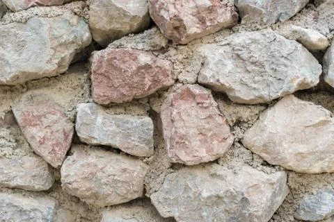 Stone wall closeup Stock Photos